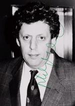 Glass, Original Portrait Photograph – signed in green ink by Philip Glass.